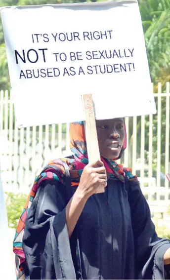  ??  ?? Former student of Ahmadu Bello University ( ABU), Zaria, Kaduna State, Salamatu Bello, during her solo protest against sex for grades in 2019 Photo Source: The Herald