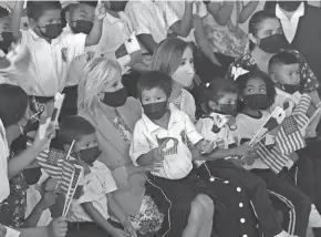  ?? ARNULFO FRANCO/AP ?? U.S. first lady Jill Biden, center left, and Panama’s first lady Yazmin Colon de Cortizo, visit a school in Panama City on Friday to learn about the “See and Hear to Learn” program that provides hearing and eye exams to students.