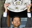  ?? Foto: dpa ?? Noch ein Abschied mit Schale: Xabi Alonso sagte Adios.