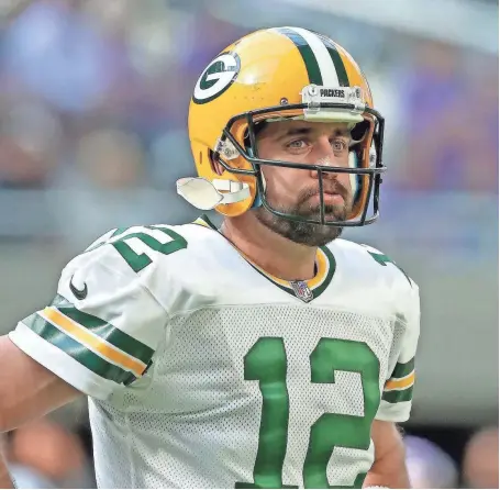  ?? NETWORK-WISCONSIN JIM MATTHEWS/USA TODAY ?? Green Bay quarterbac­k Aaron Rodgers suffered a broken right collarbone against Minnesota that required surgery.