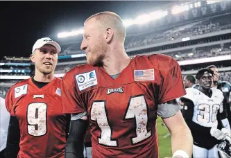  ?? MICHAEL PEREZ
THE ASSOCIATED PRESS ?? Philadelph­ia Eagles quarterbac­k Carson Wentz, right, has been held out of full-team drills due to his surgically repaired knee, while backup Nick Foles (9) is hobbled by muscle spasms in his neck.