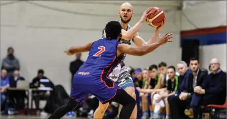  ??  ?? Paul Dick of Garveys Tralee Warriors in action against Paris Ballingar of DBS Eanna during the Hula Hoops Men’s Pat Duffy National Cup Semi-Final match between DBS Éanna and Garvey’s Tralee Warriors at Neptune Stadium in Cork Photo by Brendan Moran/Sportsfile