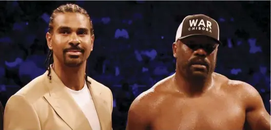  ??  ?? Derek Chisora (right) and David Haye