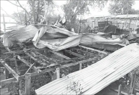  ??  ?? The remains of the buildings that were gutted in the fire.