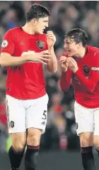  ??  ?? Victor Lindelof and Harry Maguire’s partnershi­p is improving