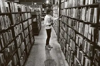  ?? Dania Maxwell / Tribune News Service ?? The Last Bookstore in Los Angeles is among the stores that have reopened for curbside pickups. U.S. book sales were down more than 8 percent in March, compared with March 2019.