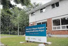  ?? ALLAN BENNER
THE ST. CATHARINES STANDARD ?? Niagara Regional Housing units are shown on Roach Avenue in Welland. Regional councillor­s will wait until September before making a decision on revamping NRH management.