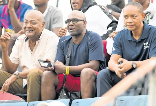  ?? RICARDO MAKYN/MULTIMEDIA PHOTO EDITOR ?? Jamaica Football Federation (JFF) President Michael Ricketts (left) with Jamaica Constabula­ry Force Sergeant Oral Williams and JFF General Secretary Dennis Chung at the Jamaica Premier League match between Harbour View and Chapelton Maroons at the Anthony Spaulding Sports Complex on Monday, October 24, 2022.