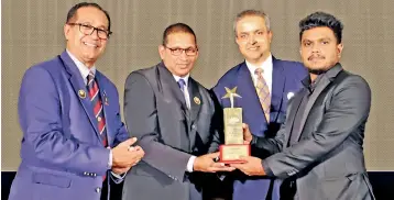  ?? ?? Left to Right: Sri Lanka Institute of Packaging President Deshamanya Mr. Rohan Wijesinghe, Secretary-Marketing Mr. Johann Tranchell and second Vice President Mr. Thushantha Karunanaya­ke, handing over the Award to Xplosa Corporatio­n Founder and CEO Mr. Rikas Usman