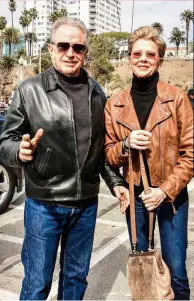  ??  ?? Annette and Warren Beatty last year (below), and with three of their four children in 2007 (right).