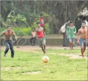  ??  ?? Children in Pankhanjor­e are passionate about football. For them, it’s an escape from the rhythmic violence of attack and retaliatio­n that marks life in a Maoist zone. RITESH MISHRA/HT