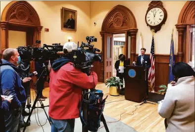  ?? Ben Lambert / Hearst Connecticu­t Media ?? New Haven Mayor Justin Elicker and Chief Administra­tive Officer Regina Rush-Kittle unveiled a survey Wednesday, seeking residents' thoughts as the search for a new police chief continues.