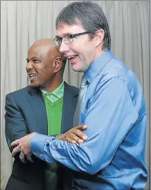  ?? Picture: PUXLEY MAKGATHO ?? TWO TO TANGO: Amcu leader Joseph Mathunjwa and Chamber of Mines CEO Roger Baxter share a light moment at the meeting yesterday.