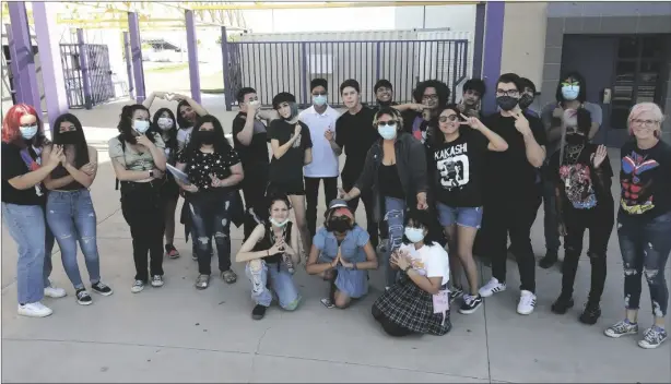  ?? PHOTO JESSICA WEST ?? The Anime Club members and advisor pose at Southwest High School on Sept. 22.