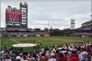  ?? DERIK HAMILTON - THE ASSOCIATED PRESS ?? The Philadelph­ia Phillies retire Roy Halladay’s number prior to a baseball game against the New York Mets, Sunday, Aug. 8, 2021, in Philadelph­ia.