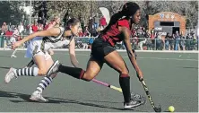  ??  ?? HOT ON HER HEELS: DSG’s Jenny du Toit, left, gives chase as Zinathi Mbenyana of Kingswood goes on a run during their first team hockey clash at DSG in Grahamstow­n on Saturday