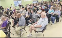  ?? Lori Van Buren / times union ?? About 100 people listened to troy mayoral candidates debate on tuesday at the Lansingbur­gh Boys and Girls Club.