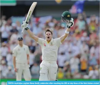  ??  ?? PERTH: Australian captain Steve Smith celebrates after reaching his 200 on day three of the third Ashes cricket Test match at the WACA ground. — AFP