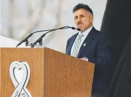  ??  ?? Frank Deangelis, Columbine’s principal 20 years ago, participat­es in a ceremony of remembranc­e Saturday at Clement Park in Jefferson County.