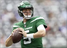  ?? AP PHOTO/ADAM HUNGER, FILE ?? FILE - New York Jets quarterbac­k Mike White (5) practices before a preseason NFL football game against the New York Giants, Sunday, Aug. 28, 2022, in East Rutherford, N.J.