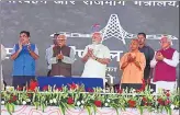  ?? SUNIL SHARMA / HT PHOTO ?? ▪ (LR) Union minister Nitin Gadkari, governor Ram Naik, PM Narendra Modi, CM Yogi Adityanath and Haryana CM Manohar Lal Khattar at the inaugurati­on of eastern peripheral expressway in Baghpat district on Sunday.