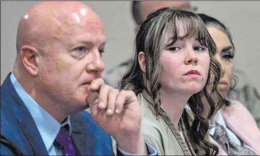  ?? Eddie Moore The Associated Press ?? Hannah Gutierrez-reed, center, sits with her attorneys during her sentencing hearing in Santa Fe, N.M., on Monday.