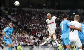  ?? Photograph: Charlotte Wilson/Offside/Getty Images ?? An unmarked Richarliso­n heads home his first goal in Tottenham’s 2-0 victory on their return to the Champions League.