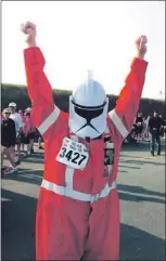  ?? — Photo by Andrew Robinson/the Telegram ?? Tomas Shea was all set for a footwork battle prior to the start of Sunday’s Tely 10. The Memorial University engineerin­g student raised $300 for Run To End Poverty as part of his Tely 10 participat­ion.