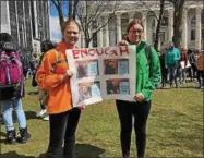  ?? DANIELLE EPTING — FOR DIGITAL FIRST MEDIA ?? Albany High School students, Rylyn Swierzewsk­i and Emma Andrew, hold their sign against gun violence at the National Walkout in West Capitol Park in Albany.