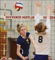  ?? AUSTIN HERTZOG — DIGITAL FIRST MEDIA ?? Pope John Paul II’s Caitlin Gilinger (7) hits down the line for a kill against West York during a PIAA 3A quarterfin­al Saturday at Gov. Mifflin.