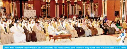  ?? — KUNA ?? KUWAIT: HH the Amir Sheikh Sabah Al-Ahmad Al-Jaber Al-Sabah and top state officials react to a robot’s performanc­e during the 18th edition of HH Sheikh Salem Al-Ali Al-Sabah’s Informatic­s Award at Bayan Palace yesterday.