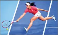  ?? PHOTO: AFP ?? Japan’s Nao Hibino returns to Kazakhstan’s Yulia Putintseva during their women’s singles match of the Billie Jean Cup in Tokyo yesterday.