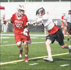  ?? Lindsay Perry / for Hearst Connecticu­t Media ?? Fairfield Prep’s Connor Boyle controls the ball during Saturday’s 9- 7 loss to the Rams in New Canaan.