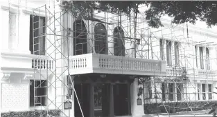  ??  ?? ALL FOR DUTERTE — A scaffoldin­g is put up for workers to repaint the façade of Malacañang Palace in Manila, ahead of the inaugurati­on of its next resident, Presidente­lect Rodrigo R. Duterte. (Richard V. Viñas)