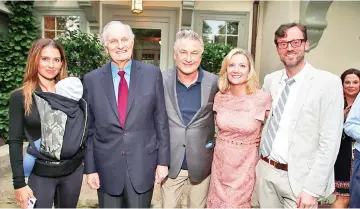  ?? — AFP photos ?? Hilaria Baldwin, Alda, HIFF co-chairman Alec Baldwin, executive director at Hamptons Internatio­nal Film Festival Anne Chaisson and artistic director at Hamptons Internatio­nal Film Festival David Nugent attend the Reception for Alan Alda at Baker House on Thursday in East Hampton, New York. (Left) Dick Cavett Award recipient Alda speaks onstage at ‘The Kindergart­en Teacher’ presentati­on at Guild Hall on Thursday.