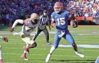  ?? JOHN RAOUX/AP ?? Florida quarterbac­k Anthony Richardson (15) scrambles past Florida State linebacker Kalen Deloach (20) for a short gain.