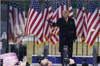  ?? AP ?? LIGHTING THE MATCH: President Trump fired up the crowd before sending it on its way to the Capitol.