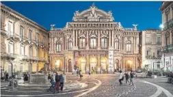  ?? SUSAN WRIGHT/THE NEW YORK TIMES ?? Built in the 1800s, the Teatro Massimo Bellini, named after the city’s most famous composer, stands over a piazza with the same name.