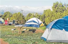  ?? Joshua Berman, Special to The Denver Post ?? Most campground­s allow you to make reservatio­ns up to six months in advance, such as the tent sites at Echo Canyon Campground near Cañon City.