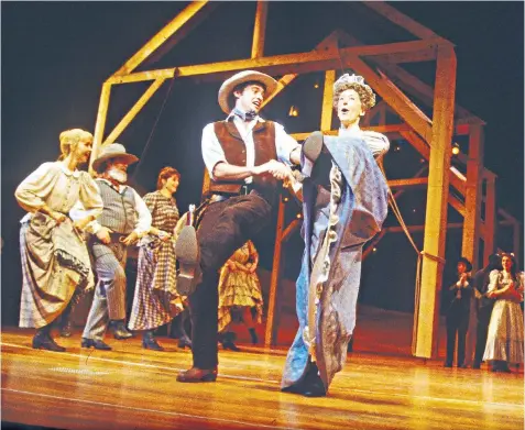  ??  ?? Made for love: the royal couple, right, saw Hugh Jackman and Maureen Lipman in Oklahoma! in 1999, above, over 50 years after their first West End theatre date; the 1955 musical film version, far right