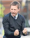  ??  ?? Neil McCann delights at the goal.