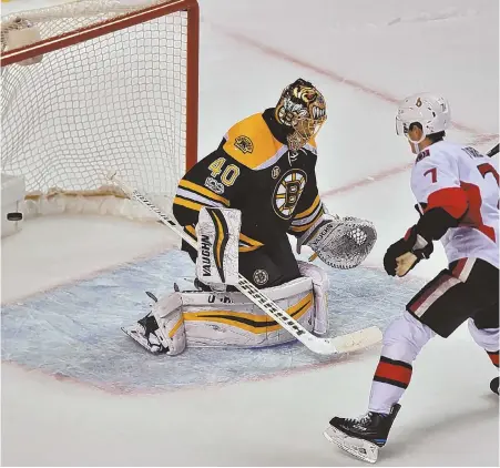  ?? sTaffphoTo­bychrisTop­herevans ?? IT’S OVER: Kyle Turris scores past Bruins goalie Tuukka Rask to lift the Senators to a shootout victory last night at the Garden.