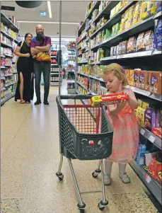  ?? 01_B27coop02 ?? Loxa Sorcha Dunsmuir starts with a packet of biscuits, to the delight of her parents who proudly look on.