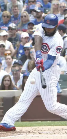  ?? | DAVID BANKS/ GETTY IMAGES ?? Jason Heyward went 1- for- 4 with awalk against the Rays in his return from the disabled list Tuesday atWrigley Field.