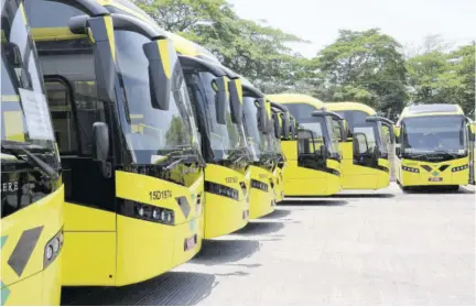  ??  ?? A Jamaica Observer file photo of Jamaica Urban Transit Company buses