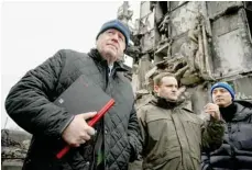  ?? Reuters ?? Former British Prime Minister Boris Johnson visits the town of Borodianka, heavily damaged during Russia’s war on Ukraine, outside of Kyiv, on Sunday. —