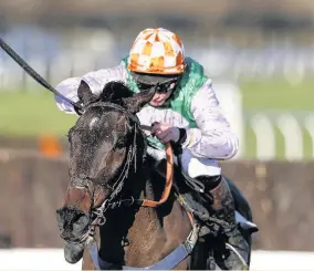  ??  ?? Jamie Moore rides Not Another Muddle to victory at Plumpton yesterday