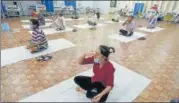  ?? SUNIL GHOSH/HT PHOTO ?? Patients practising yoga at the Covid-19 facility at the Noida Stadium.