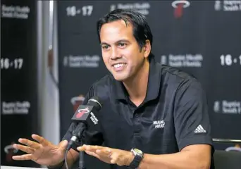  ?? Marta Lavandier/Associated Press ?? Miami Heat coach Erik Spoelstra speaks during a news conference during the team’s media day Monday.