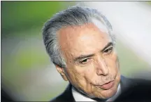  ?? Picture: REUTERS ?? DODGY DEAL: Brazil’s President Michel Temer faces calls discussing payments of hush money to a corrupt politician for his removal for